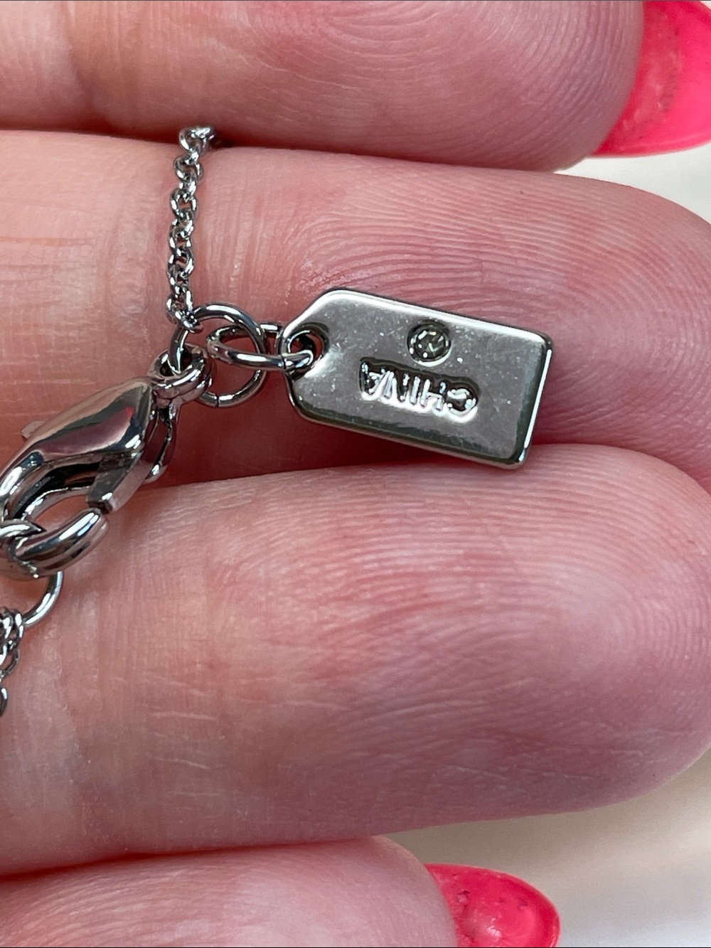 COACH Silver Necklace with Pink Enamel & Crystal Ring Charms $128 MSRP NWT - Picture 7 of 7